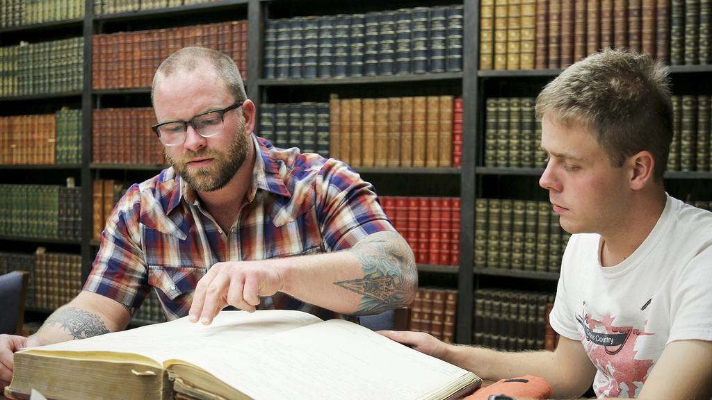 Jeff Erickson and Evan Risk researching Iowa State Penitentiary