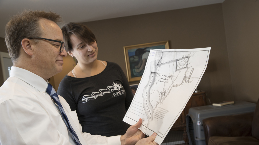 Stephen Warren working with a student
